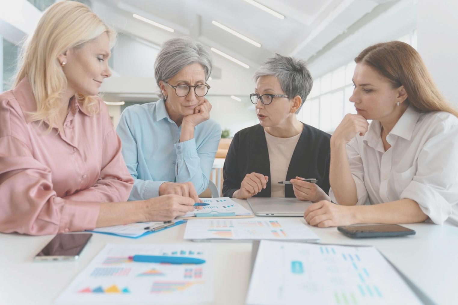 Organized workspace with investment documents and financial planning materials